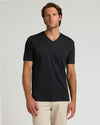 Black Premium Pima V-Neck worn by male model with beige pants.