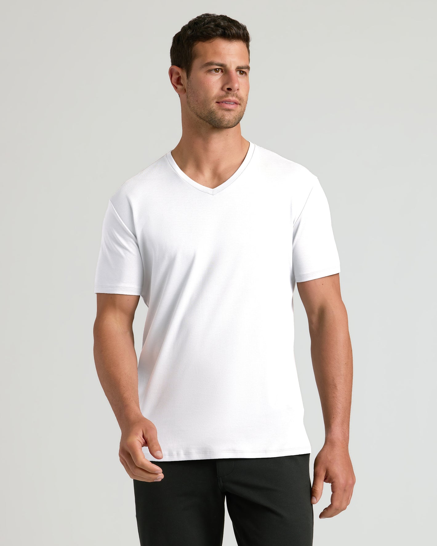 Model wearing White Premium Pima V-Neck T-Shirt.