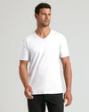 Man wearing White Premium Pima V-Neck, showcasing tailored fit and silky texture.