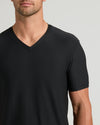Black Active V-Neck on torso, showcasing breathable, stretchable fit.