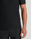 Man wearing Black Active V-Neck, showcasing its modern fit and breathable comfort.