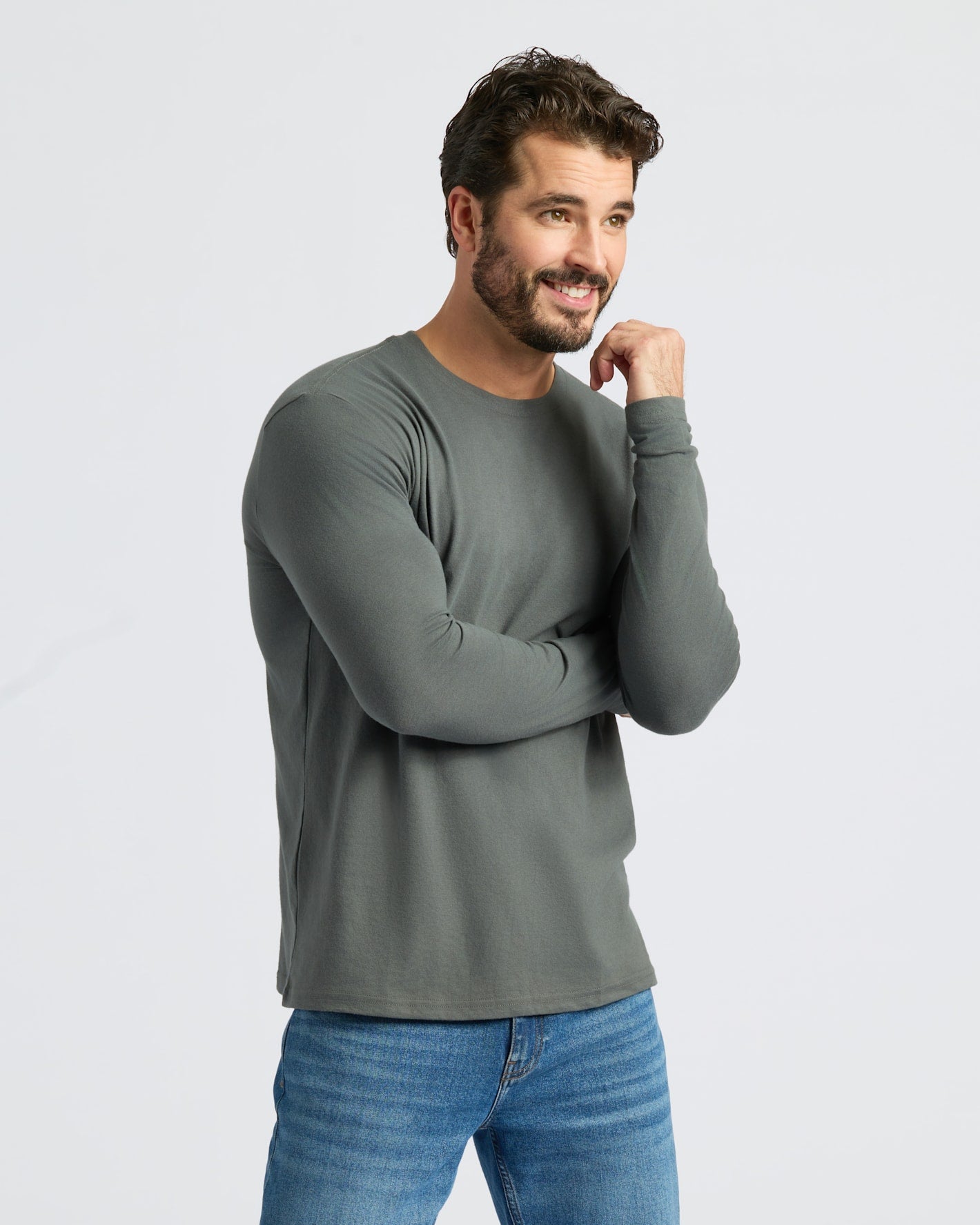 Man wearing Classic Long Sleeve Crew Neck, relaxed pose.