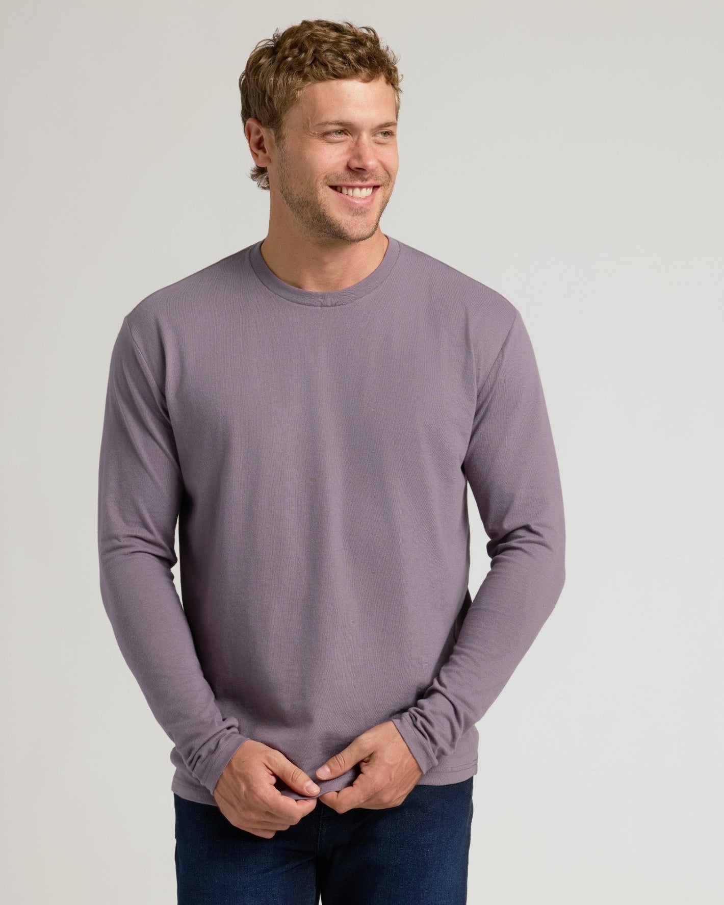 Young man modeling Seasonal Classic Long Sleeve Henley 3-Pack.