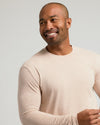 Man in Heather Camel Classic Long Sleeve Crew Neck, smiling.