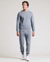 Man wearing Dusty Blue Fleece French Terry Pullover Crew Neck with joggers.
