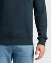 Navy Fleece French Terry Pullover Crew Neck with light-wash jeans.
