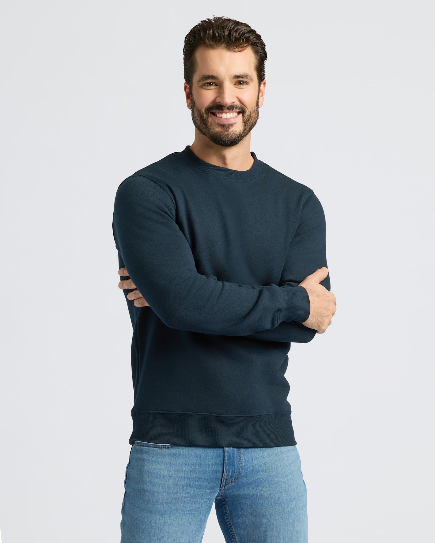 Man wearing the Navy Fleece French Terry Pullover Crew Neck.