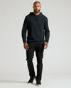 Model in All Black Classic Waffle Hoodie 3-Pack with trousers and sneakers.