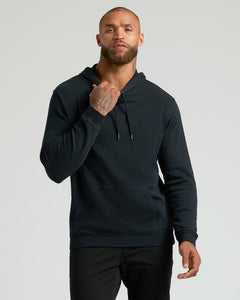 True ClassicMale model in All Black Classic Waffle Hoodie.