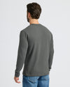 Man wearing Carbon Heavyweight Long Sleeve Pocket Crew, highlighting back fit.