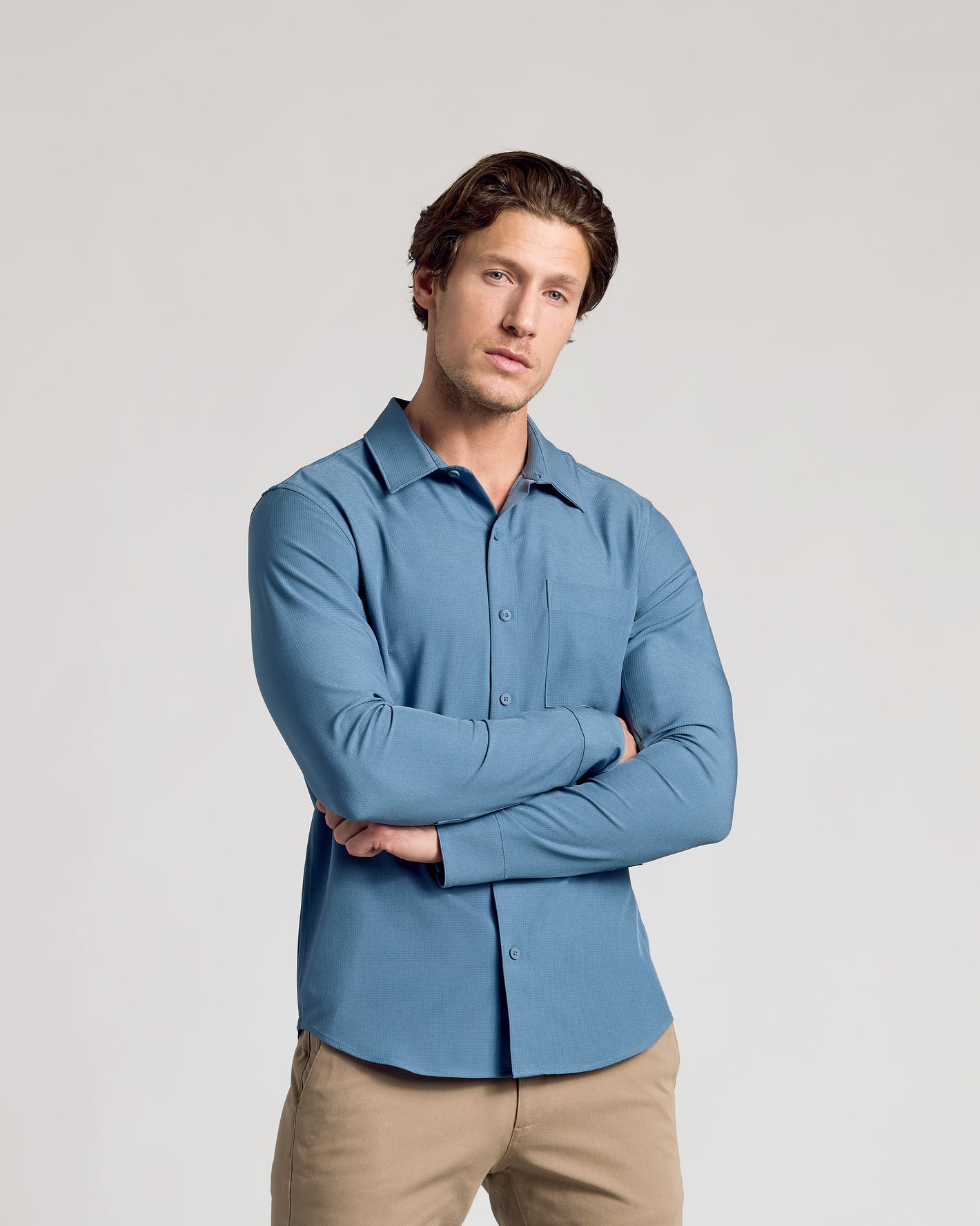 Fiord Long Sleeve Ripstop Commuter Shirt worn by man.