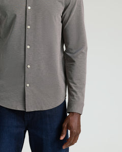 True ClassicOak & White Standard Long Sleeve Modern Knit Oxford worn with dark-blue jeans.