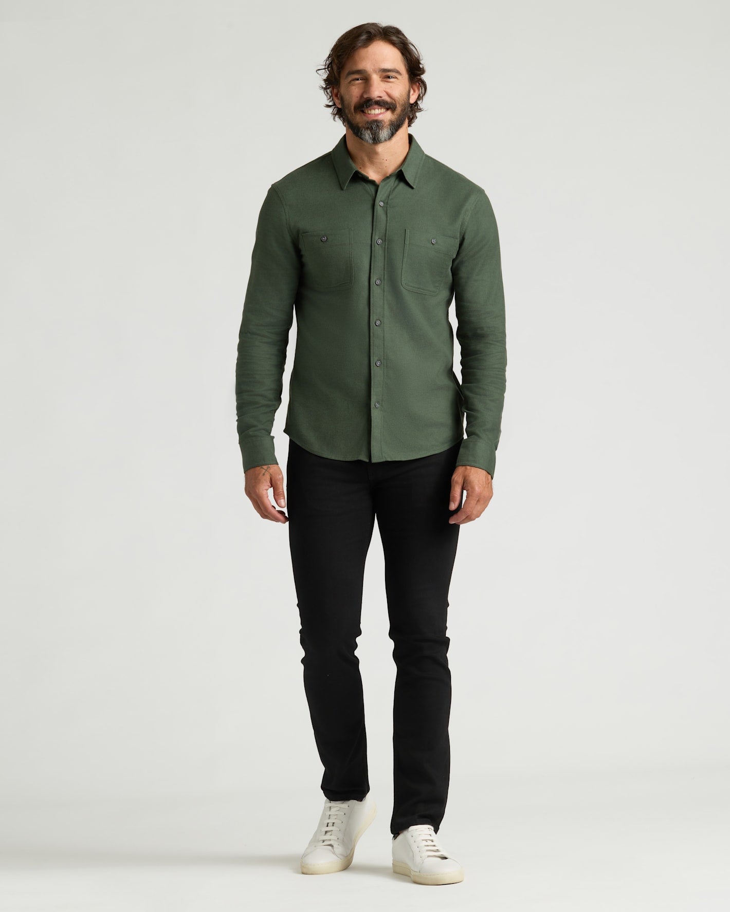 Man wearing Long Sleeve Flannel Shirts 3-Pack, showcasing relaxed fit.