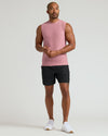 Quartz Rose Sleeveless Active Muscle Tee on model, paired with black shorts.