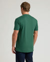 Balsam Pocket Crew Tee on model, relaxed back view.