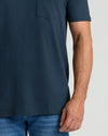 Navy Pocket Crew Tee on torso with chest pocket and jeans.