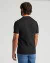 Back view of Black Heavyweight Pocket Crew T-shirt on man.