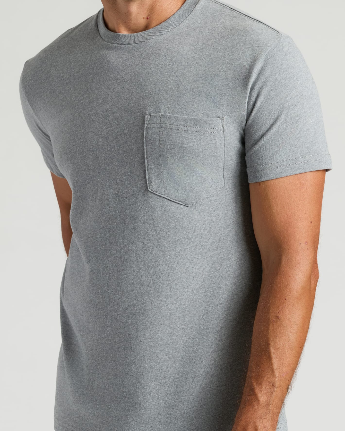 Heather Gray Heavyweight Pocket Crew with crew neck and reinforced chest pocket.