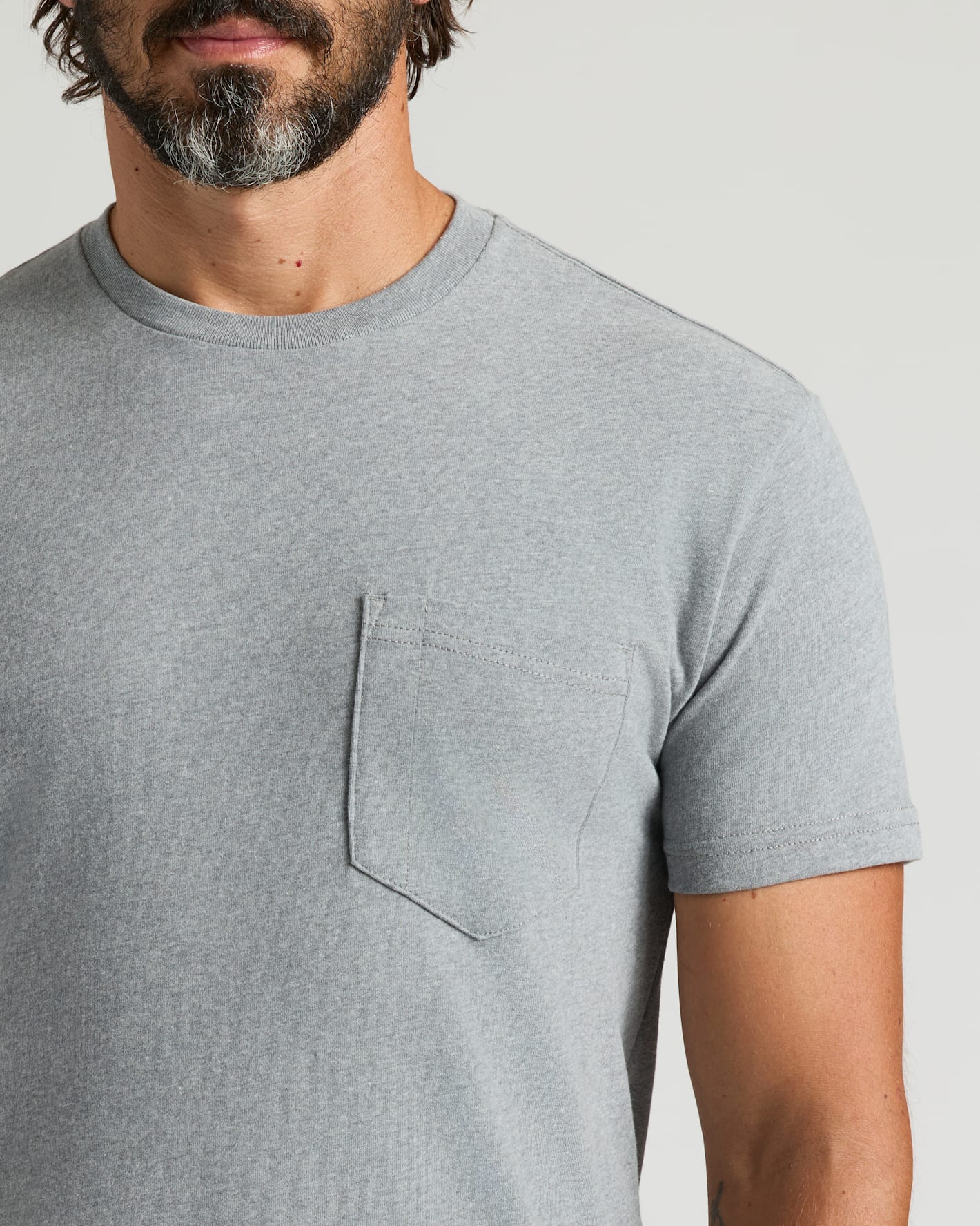 Heather Gray Heavyweight Pocket Crew, short-sleeve, with visible chest pocket.