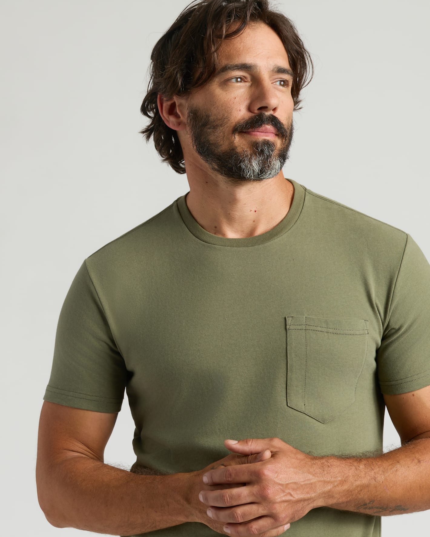 Military Green Heavyweight Pocket Crew on male model with patch pocket.