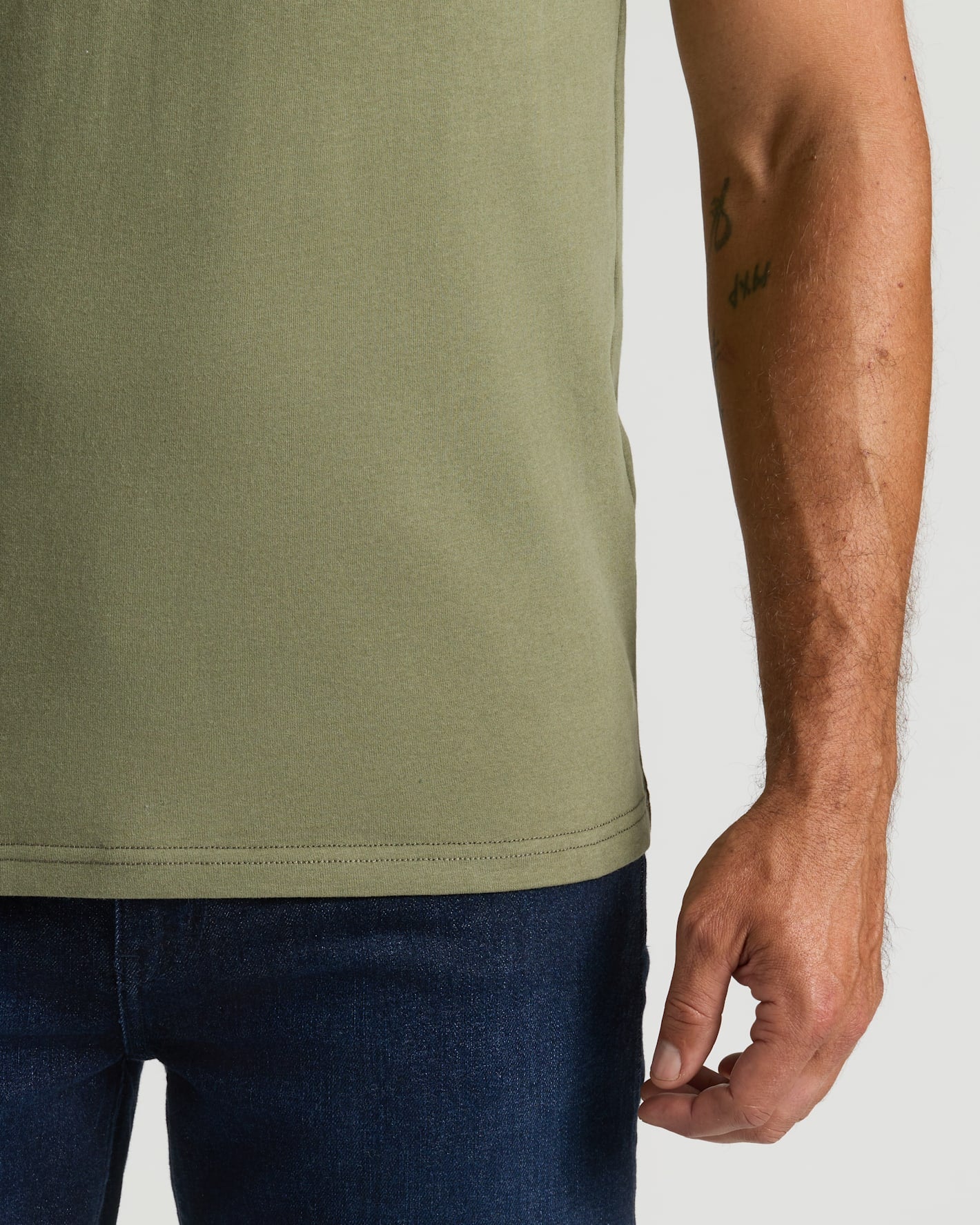 Military Green Heavyweight Pocket Crew with visible stitching and durable feel.