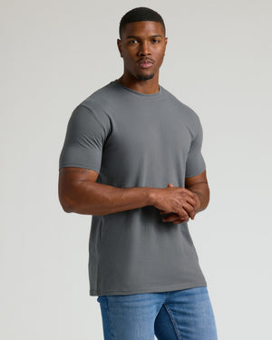 Man wearing Carbon Tall Straight Hem Crew Neck T-Shirt and jeans.