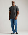 Man in Charcoal Heather Gray Short Sleeve Tall Crew T-shirt.