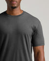 Man wearing Charcoal Heather Gray Short Sleeve Tall Crew t-shirt.