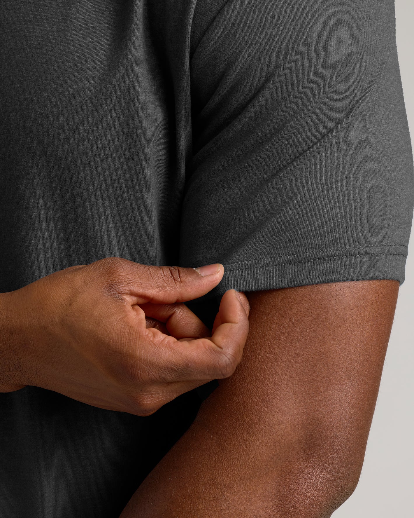 Charcoal Heather Gray Short Sleeve Tall Crew's sleeve detail, showcasing texture.