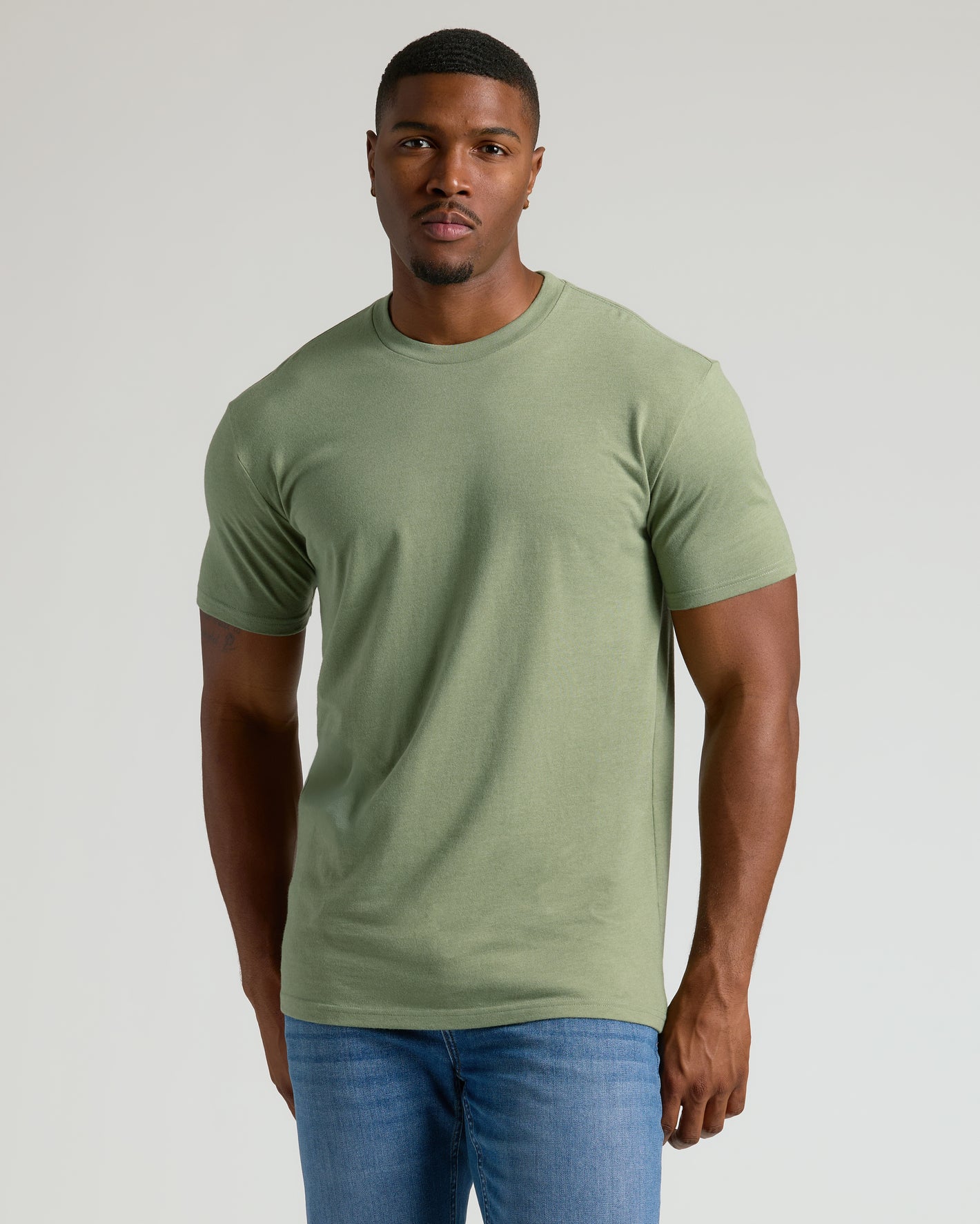 Seasonal Tall Straight Hem T-Shirt in moss-green, worn by a young man.