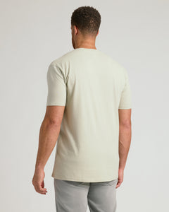 True ClassicBack view of a man wearing a Dark Heather Graystone Tall Straight Hem Crew Neck T-Shirt.