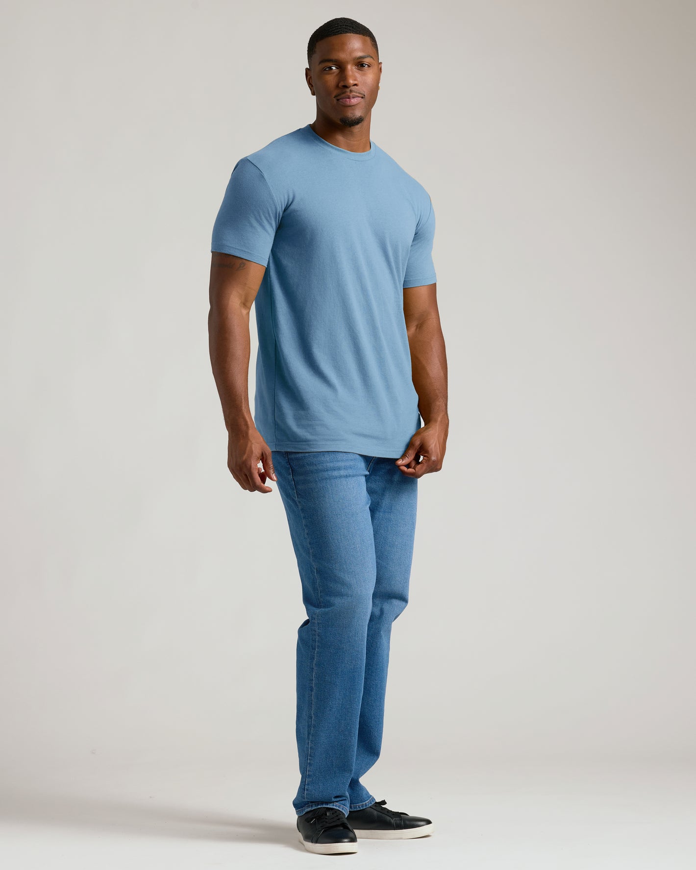 Indigo Tall Straight Hem Crew Neck T-Shirt worn by a relaxed man.