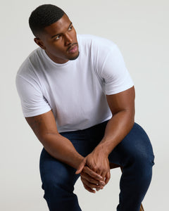 True ClassicYoung man wearing All White Tall Classic Crew 10-Pack.