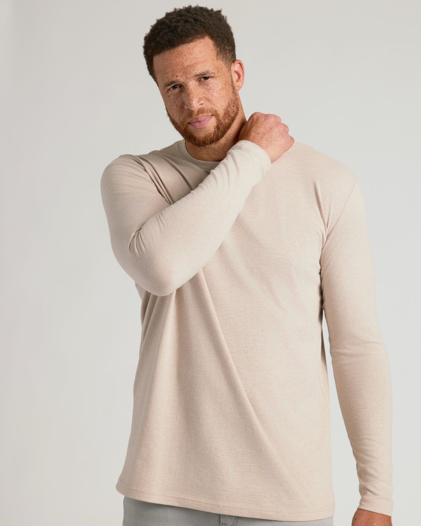 Tall man in beige Seasonal Tall Classic Long Sleeve Crew shirt.