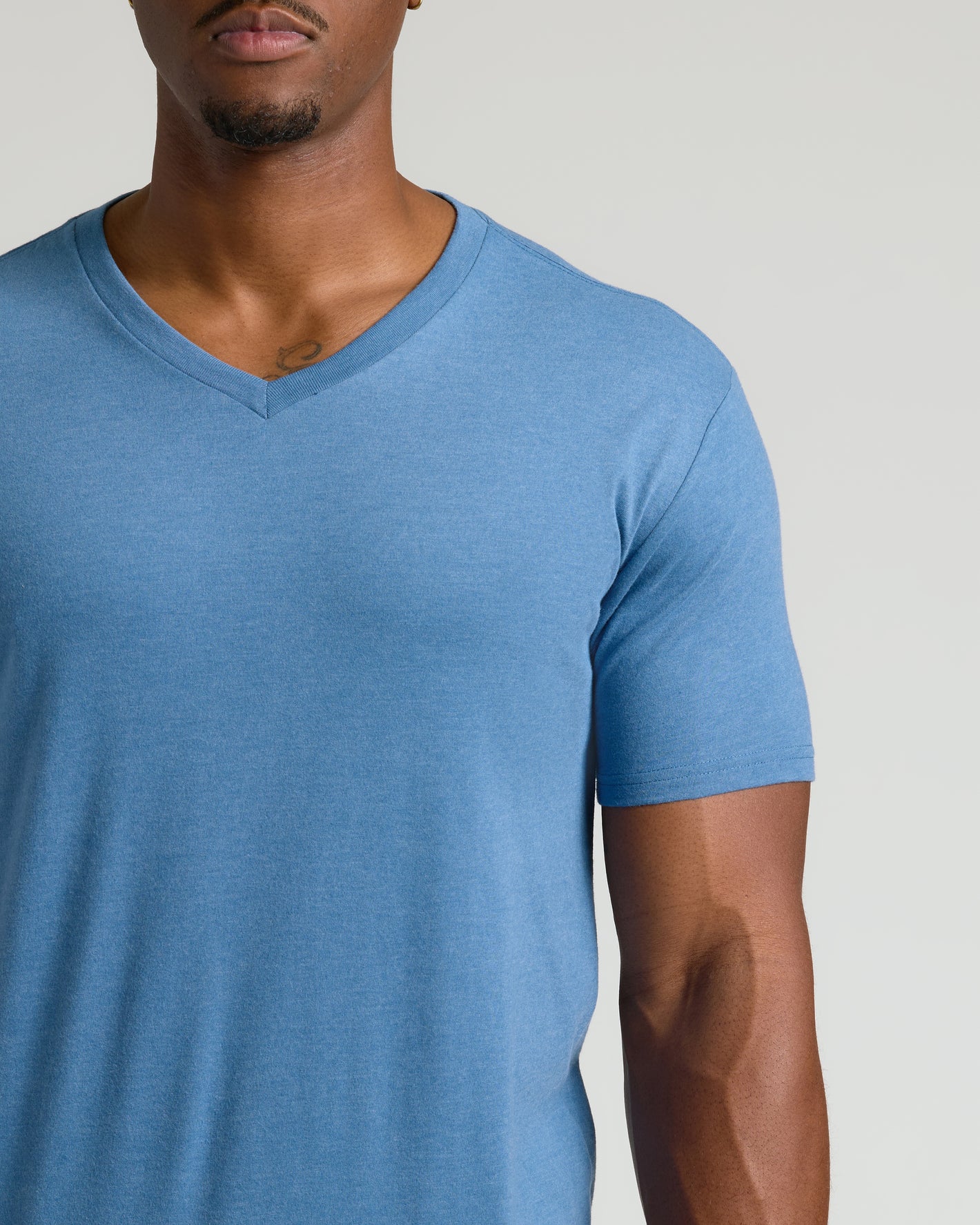 Dark Heather Blue Lake Tall Classic V-Neck on man, showcasing tailored fit.