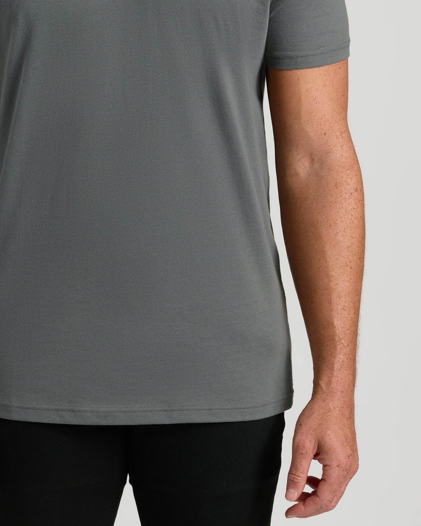 Carbon Tall Short Sleeve Classic V-Neck on model, showcasing tailored fit.