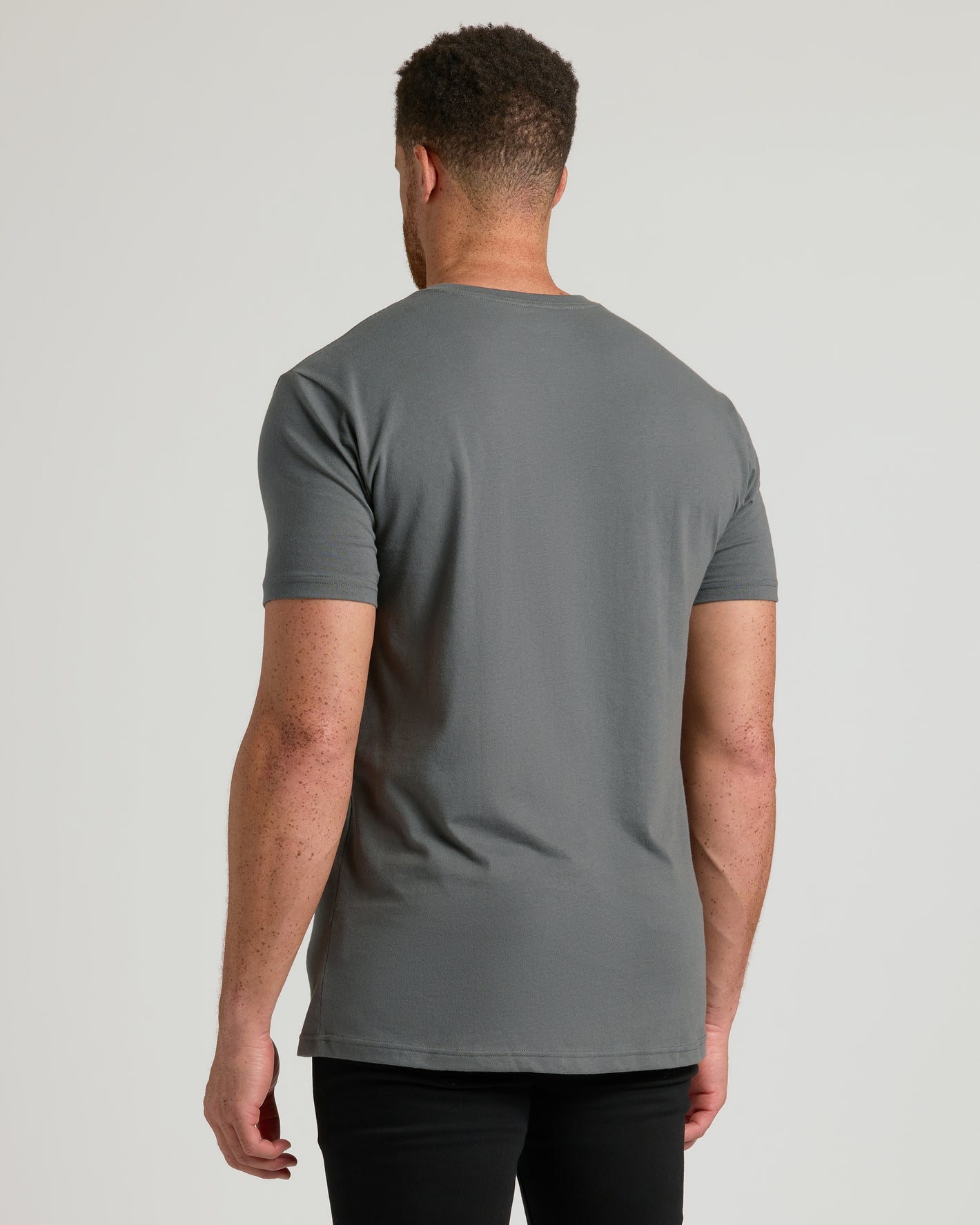 Back view of Carbon Tall Short Sleeve Classic V-Neck on person.