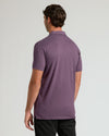 Man wearing Dark Heather Plum Short Sleeve Tall Polo, showing back details.