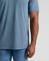 Dark Heather Tempest Short Sleeve Tall Polo worn with medium-wash jeans.