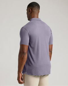 True ClassicMan wearing Dark Heather Amethyst Short Sleeve Tall Polo from the back.