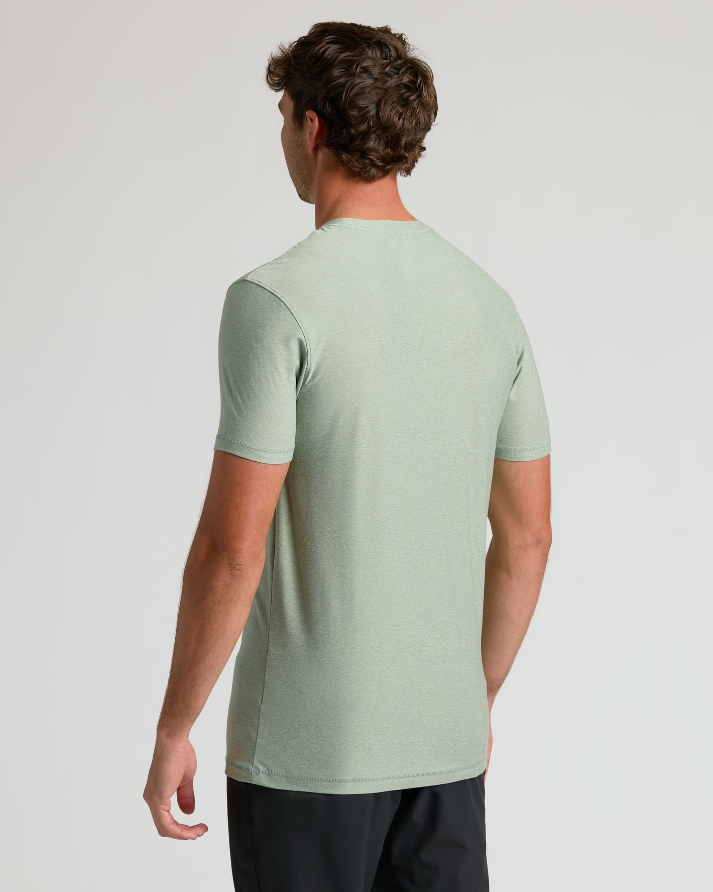 Lichen Tall Active Crew Neck 2.0, back view on man.