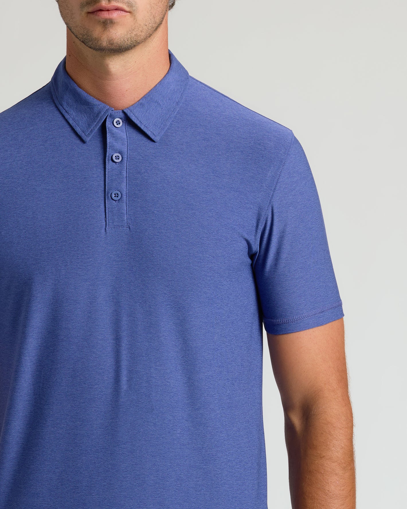 Cosmos Short Sleeve Tall Active Polo with collar and three-button placket.