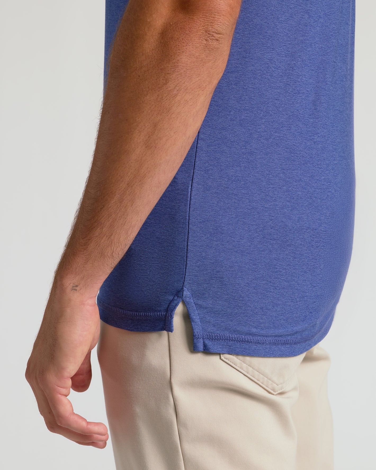 Cosmos Short Sleeve Tall Active Polo with side slit and detailed seam.