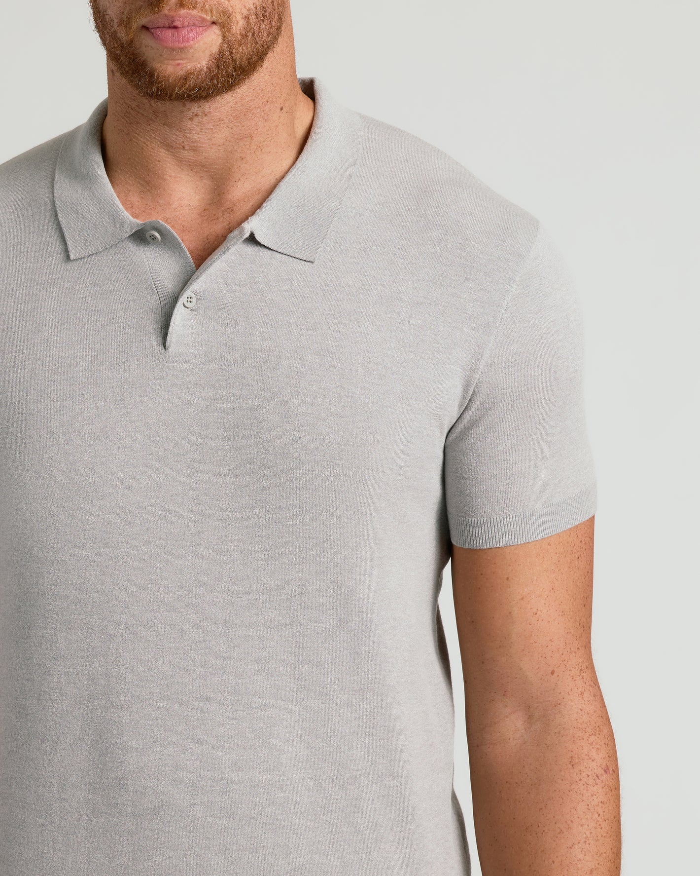 Man wearing Heather Gray Tall Dressy Polo with knit texture.