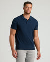 Navy Tall Dressy Polo on male model with gray trousers.