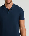 Navy Tall Dressy Polo on man with reddish-brown beard.