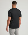 Man wearing Black Tall Premium Pima V-Neck T-shirt, back view.
