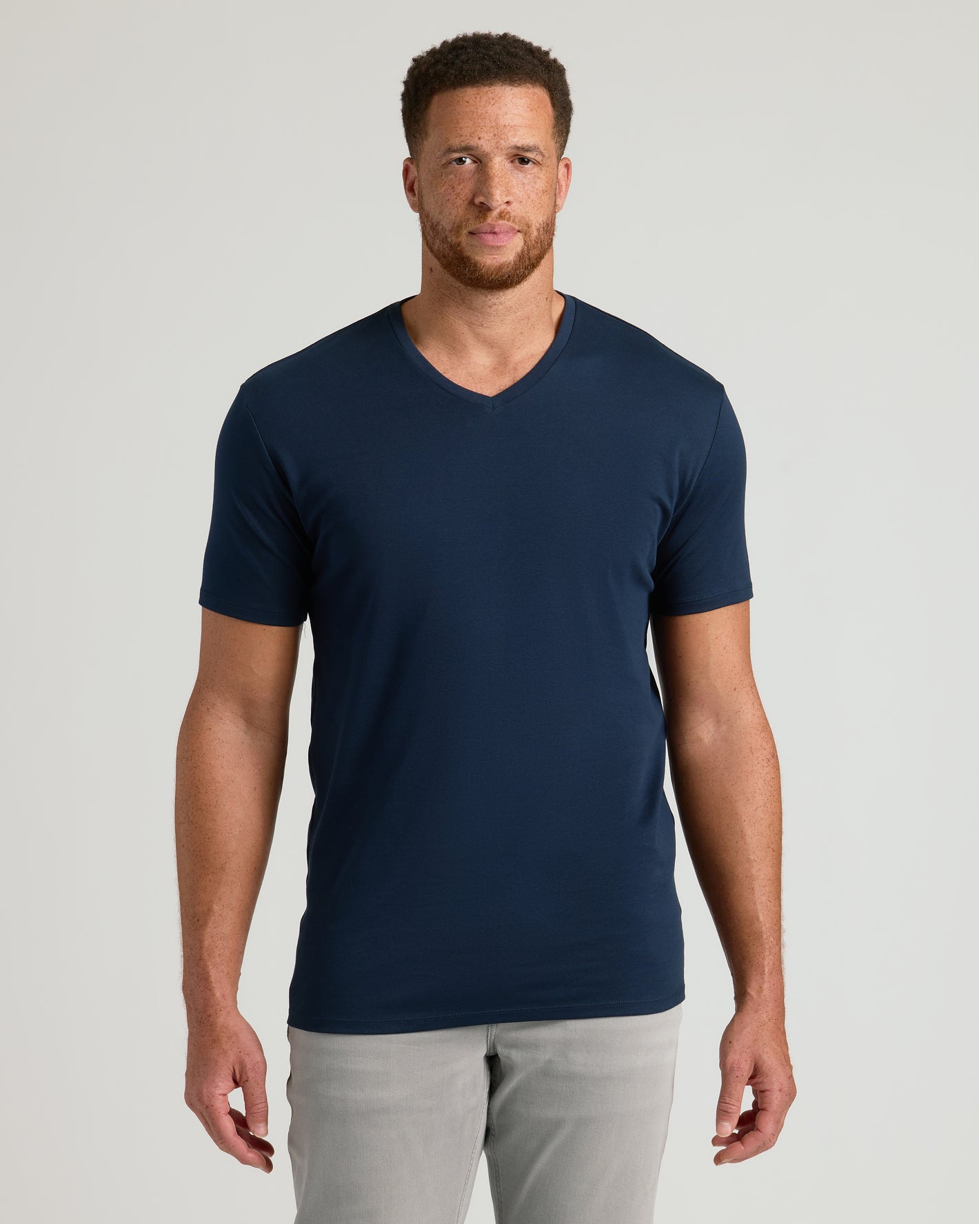 Man in Carbon & Navy Tall Premium Pima V-Neck T-Shirt.