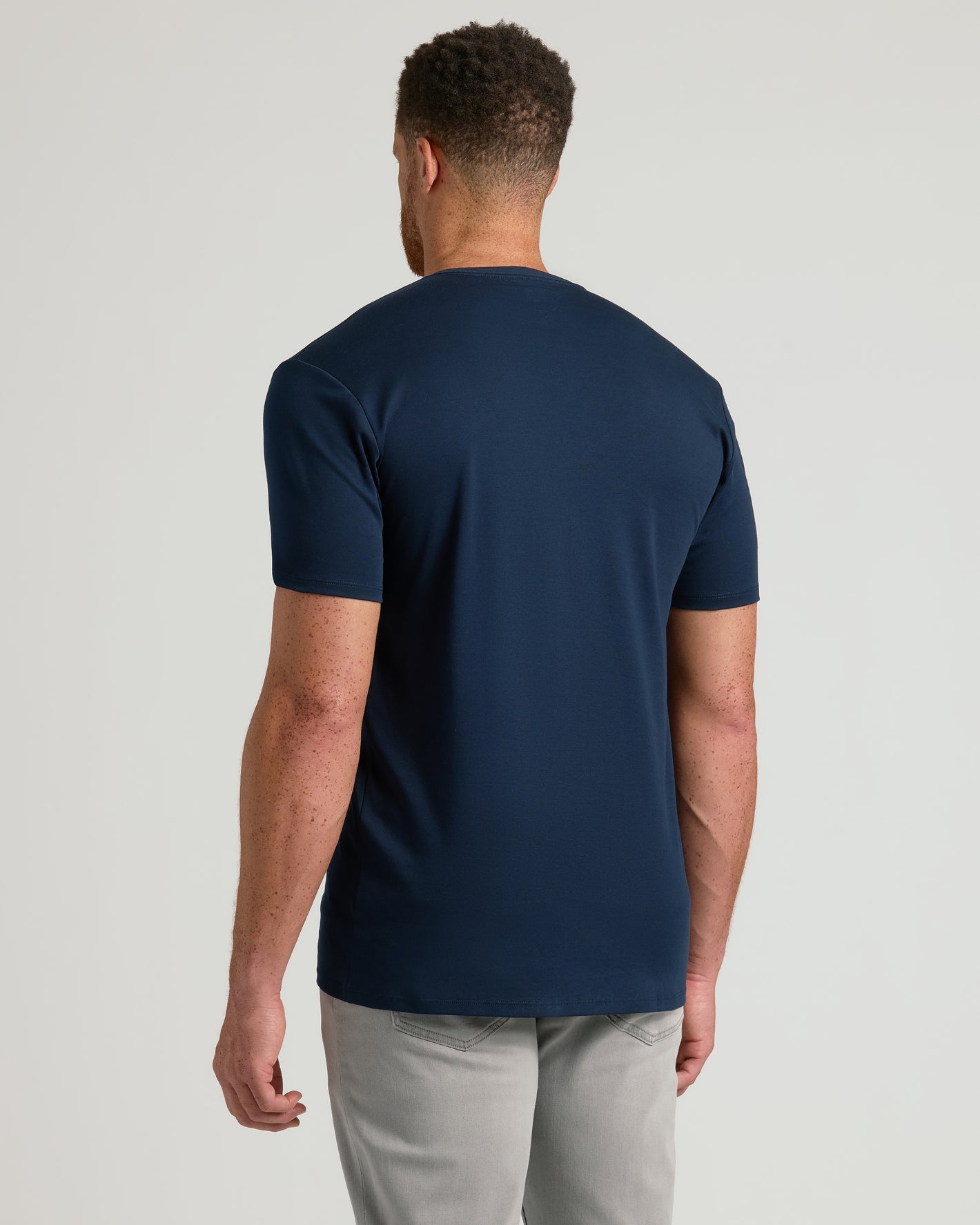 Back view of Navy Tall Premium Pima V-Neck on a man.