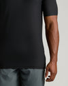 Black Tall Active V-Neck on person’s midsection, showcasing fit and style.